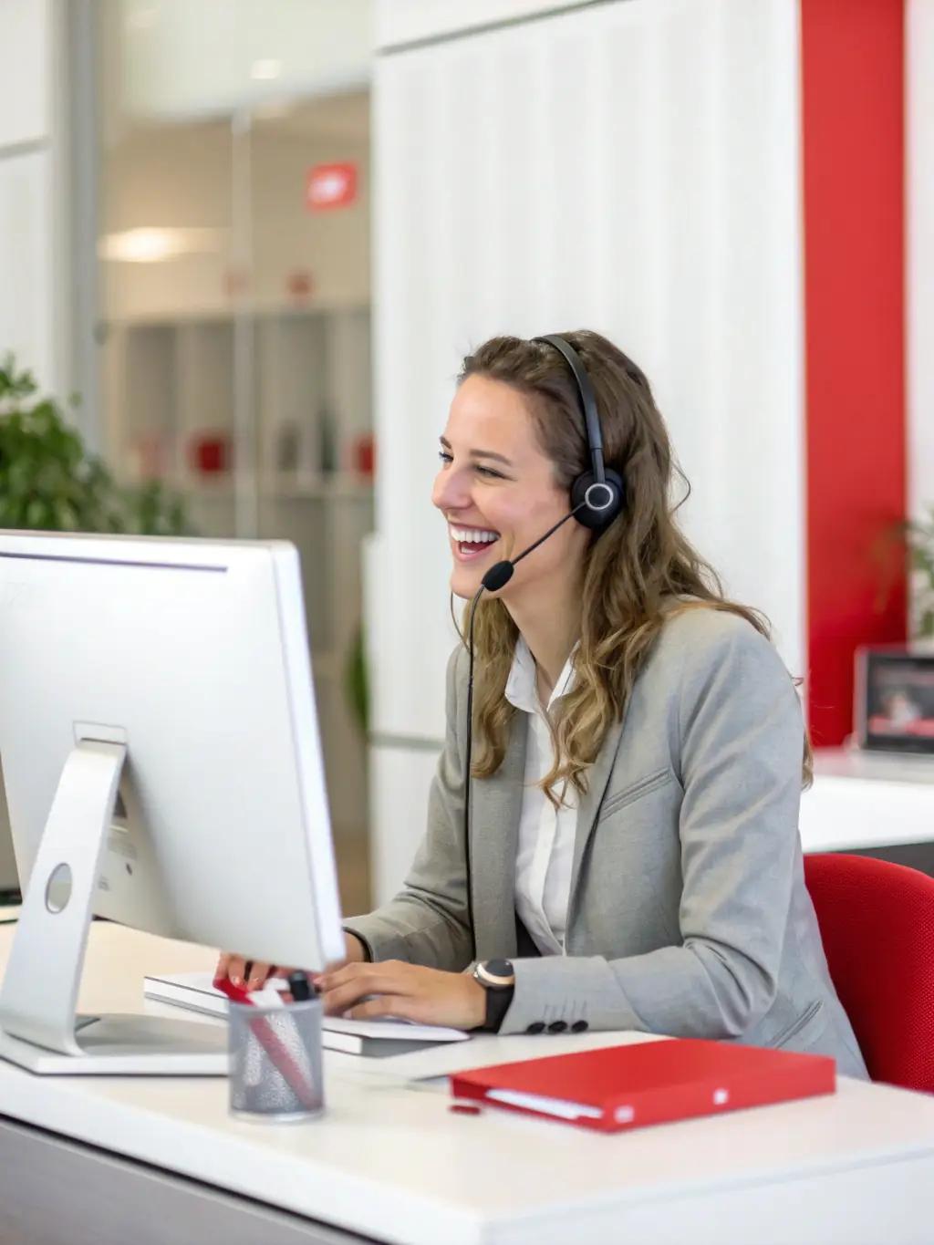 A friendly technical support agent assisting a customer over the phone, showcasing the real, human support provided by Phone Systems Atlanta to businesses in Peachtree City.